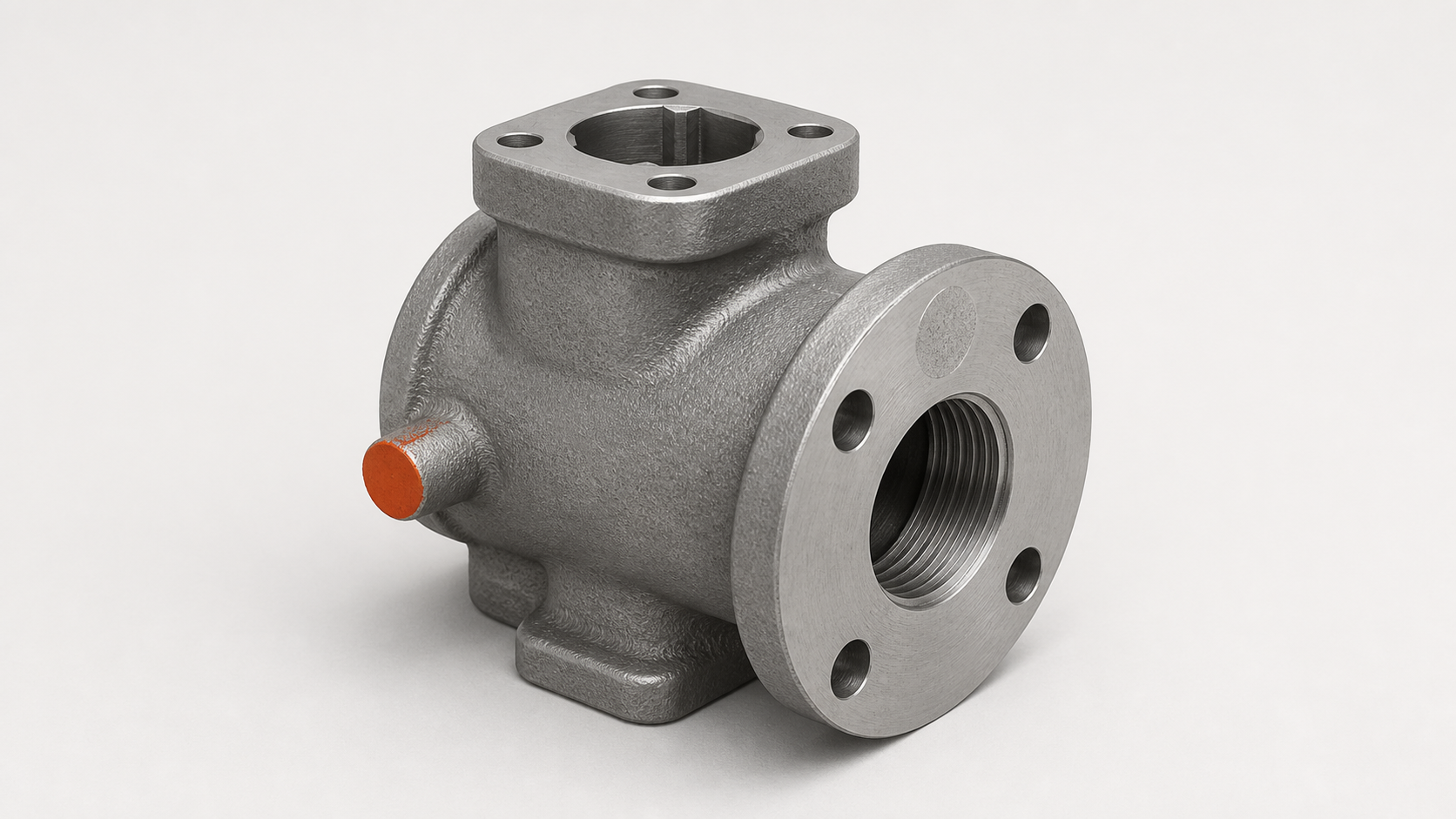 Ferrous investment casting valve body showing a ground gate stub on the machined flange face and a second gate stub on a non-functional external wall