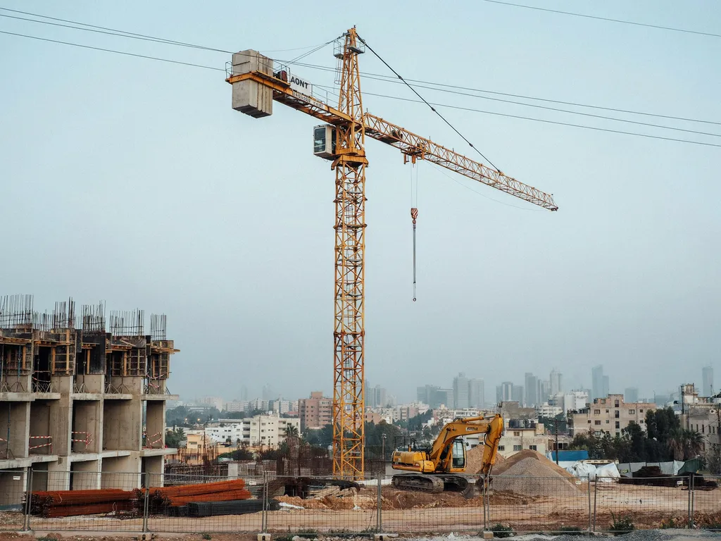 Custom stackable tower crane counterweight block with lifting eyes