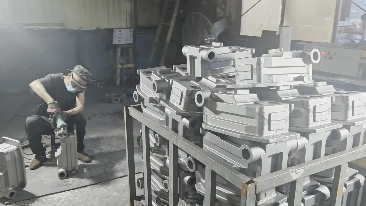 Fettling and grinding grey iron housings at Kurt Foundry